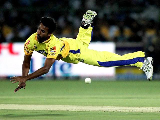 Chennai Super Kings' Yo Mahesh dives to stop the ball while bowling against Rajasthan Royals during their IPL-5 match in Jaipur. PTI/Aman Sharma