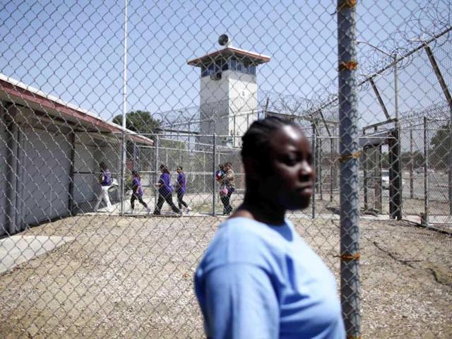 Shonta Montgomery, 28, waits to see her son Levell Jones, 7, whom she has not seen in 17 months, at California Institute for Women state prison in Chino, California. An annual Mother's Day event, Get On The Bus, brings children in California to visit their mothers in prison. Reuters/Lucy Nicholson