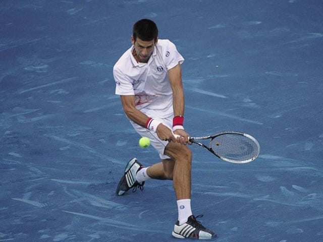 Novak-Djokovic-returns-a-shot-a-tennis-match-at-the-Madrid-Masters-AFP-Photo-Pedro-Armestre Novak-Djokovic-returns-a-shot-a-tennis-match-at-the-Madrid-Masters-AFP-Photo-Pedro-Armestre