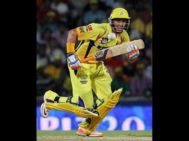 Chennai Super Kings' opener Michael Hussey plays a shot during the IPL-5 match against Delhi Daredevils in Chennai. (PTI Photo/R Senthil Kumar)