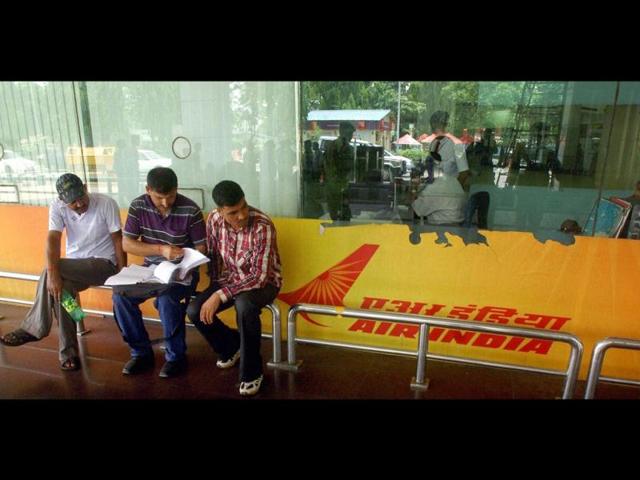 Stranded passengers at Netaji Subhash Chandra Bose International Airport in Kolkata as many Air India flights were cancelled. (PTI Photo)