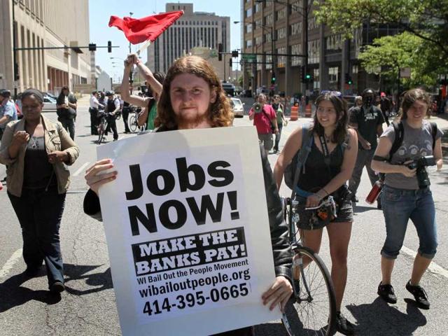 Protesters march through downtown in Chicago. This was the second day of protests in what is expected to be a full week of demonstrations as the city prepares to host the Nato Summit May 20-21. AFP/Scott Olson
