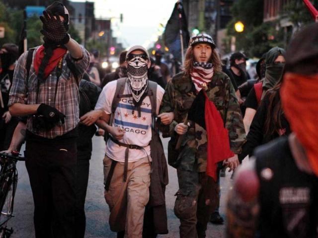 Protestors march in a rally against police brutality in Chicago, Illinois. This was the second day of protests in what is expected to be a full week of demonstrations as the city prepares to host the NATO Summit May 20-21.