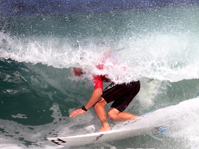 Austalian Joel Parkinson rides a wave to finish second behind US John John Florence, of Hawaii, during the final of the Association of Surfing Professionals' men's 2012 ASP World Championship Tour at Barra da Tijuca beach in Rio de Janeiro, Brazil. AFP/Christophe Simon