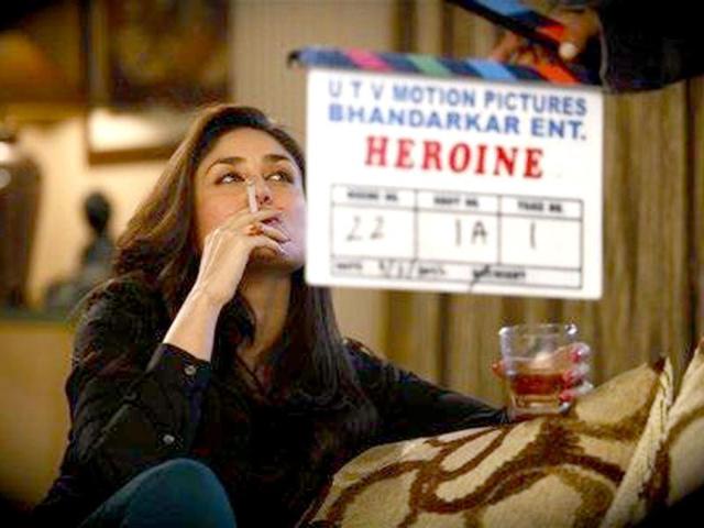 Bebo-shows-her-bold-side-in-this-still-from-Heroine-as-she-s-seen-smoking-and-drinking-with-elan-Madhur-Bhandarkar-tweeted-the-pic-saying-My-Heroine-Kareena-Bold-Edgy-Uncensored-Like-never-before Bebo-shows-her-bold-side-in-this-still-from-Heroine-as-she-s-seen-smoking-and-drinking-with-elan-Madhur-Bhandarkar-tweeted-the-pic-saying-My-Heroine-Kareena-Bold-Edgy-Uncensored-Like-never-before
