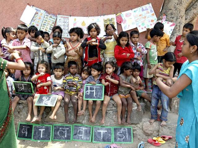Children learn a new lesson at a creche in Daya Basti. HT/Raj K Raj