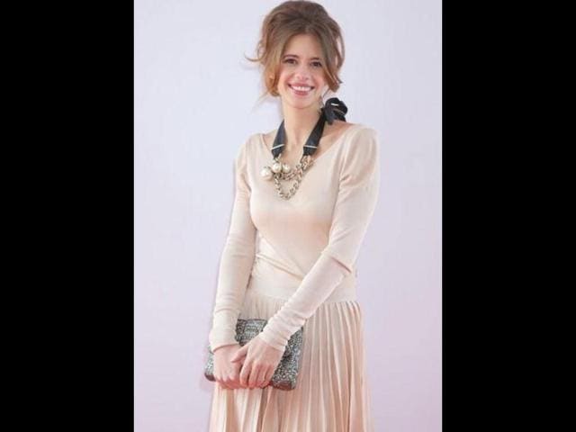 Kalki poses at the red carpet. Anurag Kashyap's Gangs of Wasseypur is making the right noises at the 65th Cannes Film Festival where the world premiere of the film received a full house.