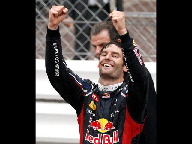 Red Bull driver Mark Webber, of Australia, celebrates after winning the Monaco Formula One Grand Prix at the Monaco racetrack, in Monaco. (AP Photo/Antonio Calanni)