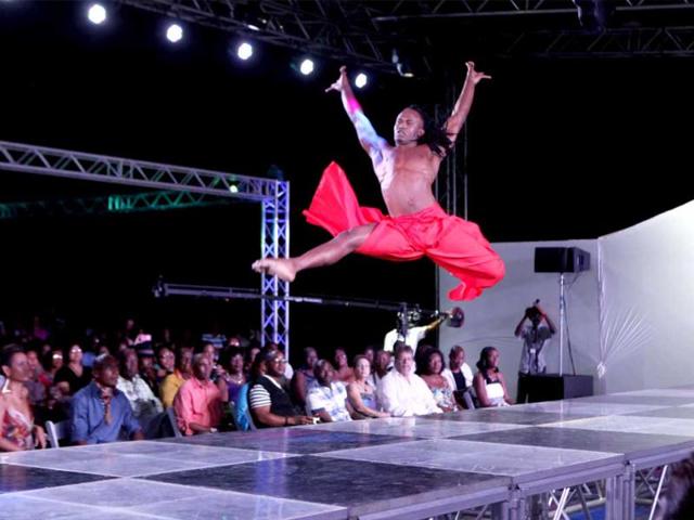 Dancer Kriston Trim performs on the final day of Tobago Fashion Weekend at Pigeon Point Heritage Park, Pigeon Point. Agencies