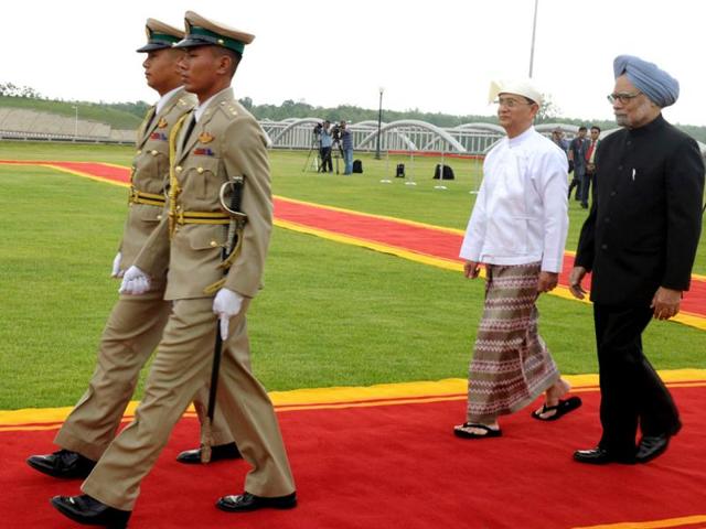 Prime Minister Manmohan Singh and Myanmar's President Thein Sein inspect the guard of honour before their meeting in Naypyitaw. Singh will seek to bolster ties this week during the first visit by an Indian prime minister to Myanmar in 25 years. His official agenda includes road, rail, waterways and air links, says India's foreign ministry. Reuters/Press Information Bureau of India/Handout