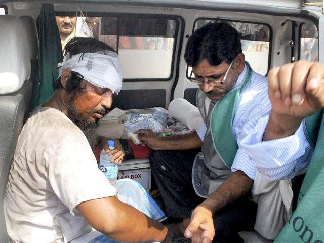 An injured being treated after Doon Express, on its way from Howrah to Dehradun, derailed near Koridia village about 35 km from Jaunpur in Uttar Pradesh. PTI Photo