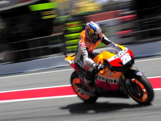 Repsol Honda Team's Spanish Dani Pedrosa leaves the pits of the Catalunya racetrack in Montmelo, near Barcelona, during the MotoGP second training session of the Catalunya Moto GP. AFP/Josep Lago