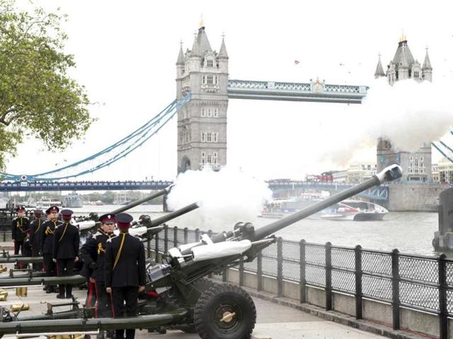 Soldiers of the Honorable Artillery Company fire blank rounds during a 62 gun salute at the Tower of London to mark the start of diamond jubilee weekend celebrations for Britain's Queen Elizabeth II. AFP/Miguel Medina