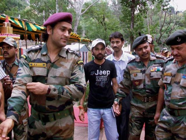 Lieutenant Colonel MS Dhoni, interacts with soldiers on the Line of Control (LoC) on Jammu and Kashmir's border with Pakistan, near Jammu on Saturday. (PTI Photo)
