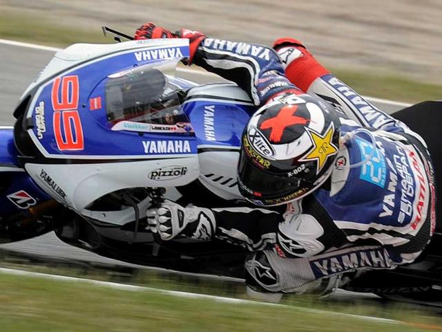 Yamaha Factory Racing's Spanish Jorge Lorenzo rides during the MotoGP race of the Catalunya Moto GP at the Catalunya racetrack in Montmelo, near Barcelona. AFP/Lluis Gene