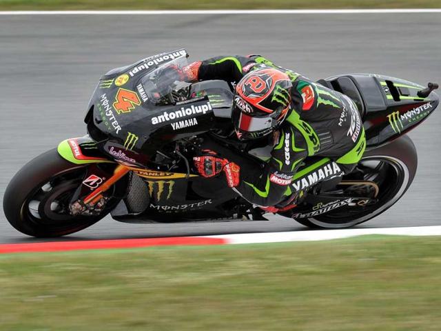 Monster Yamaha Tech 3's Italian Andrea Dovizioso rides during the MotoGP race of the Catalunya Moto GP at the Catalunya racetrack in Montmelo, near Barcelona. AFP/Lluis Gene