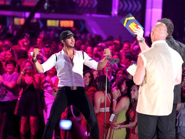 Luke Bryan reacts to winning the award for Male Video Of The Year at the 2012 CMT Music Awards in Nashville. AP Photo/John Shearer