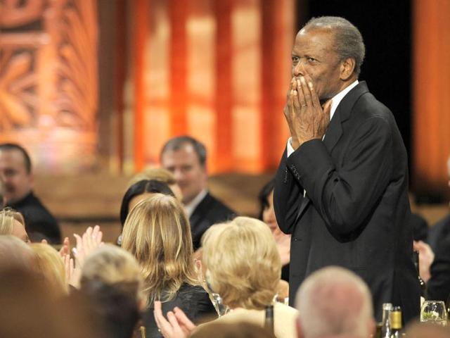 Sidney Poitier attends the AFI Life Achievement Award Honoring Shirley MacLaine at Sony Studios in Culver City, California. AP