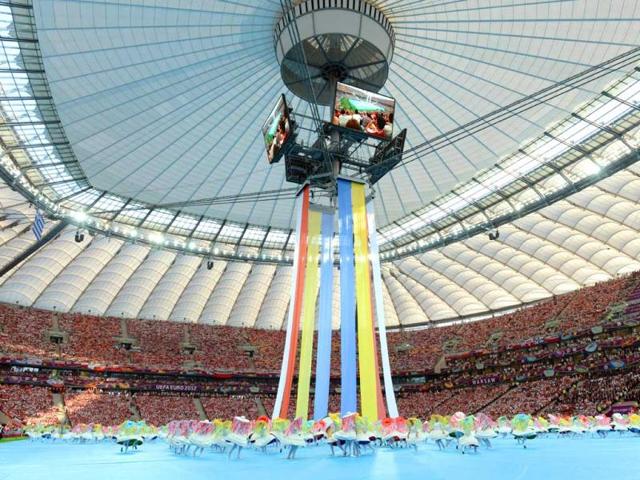 Artists perform during the opening ceremony held ahead of the Euro 2012 championships football match Poland vs Greece at the National Stadium in Warsaw. (AFP Photo/Christof Stache)