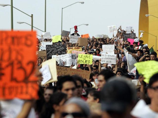 People participate in an anti-PRI "Yosoy132" (I am 132) movement march against the candidature of Enrique Pena Nieto in Guadalajara, Mexico. Reuters/Alejandro Acosta