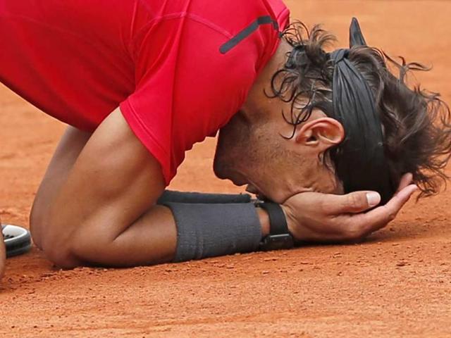 Rafael Nadal of Spain celebrates winning the mens final match against Novak Djokovic of Serbia at the French Open tennis tournament in Roland Garros stadium in Paris. (AP Photo/Bernat Armangue) Rafael Nadal of Spain celebrates winning the mens final match against Novak Djokovic of Serbia at the French Open tennis tournament in Roland Garros stadium in Paris. (AP Photo/Bernat Armangue)