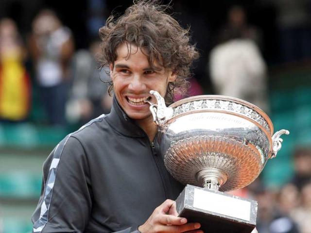 Spain's Rafael Nadal holds the cup after defeating Serbia's Novak Djokovic in their men's final match in the French Open tennis tournament at the Roland Garros stadium in Paris. (AP Photo/Bernat Armangue) Spain's Rafael Nadal holds the cup after defeating Serbia's Novak Djokovic in their men's final match in the French Open tennis tournament at the Roland Garros stadium in Paris. (AP Photo/Bernat Armangue)