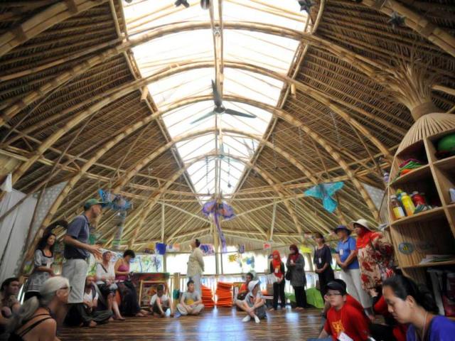 People visit a building made of bamboo at a school at a village in Sibang, Badung regency on Bali island. AFP/Sonny Tumbelaka