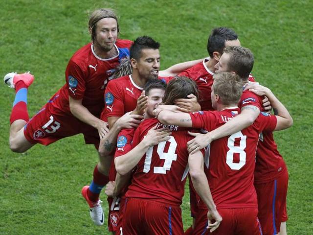 Czech Republic's Petr Jiracek, front left, is congratulated by teammates after scoring the opening goal during the Euro 2012 soccer championship Group A match between Greece and Czech Republic in Wroclaw, Poland. AP/Anja Niedringhaus