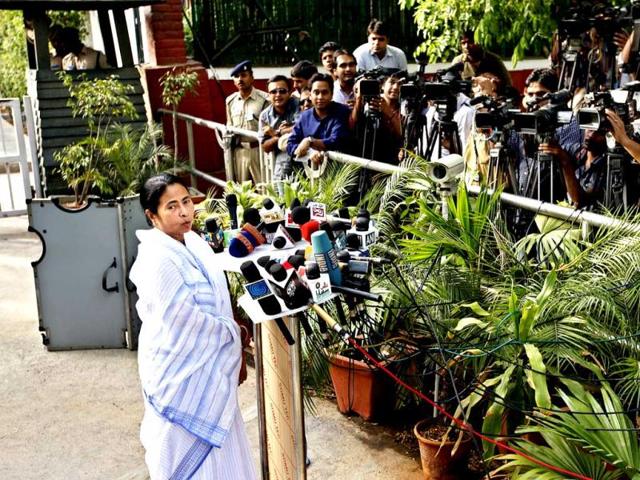 Mamata Banerjee speaks to the media after meeting UPA chairperson Sonia Gandhi at her residence in New Delhi. (HT Photo/Ajay Aggarwal)