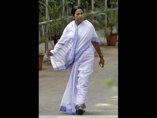 Mamata-Banerjee-chief-minister-of-West-Bengal-walks-after-her-meeting-with-chief-of-Congress-party-Sonia-Gandhi-at-her-residence-in-New-Delhi-Banerjee-met-Gandhi-to-discuss-possible-party-candidates-for-the-post-of-the-President-of-India-Reuters