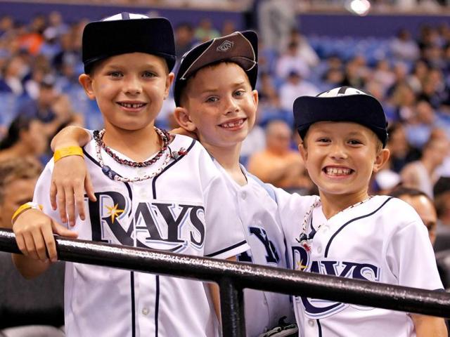 Fans of the Tampa Bay Rays have their rally caps on in the ninth inning againstof the New York Mets at Tropicana Field in St. Petersburg, Florida. AFP/J Meric