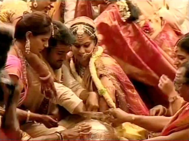 Ram Charan Teja and Upasana during a ceremony.