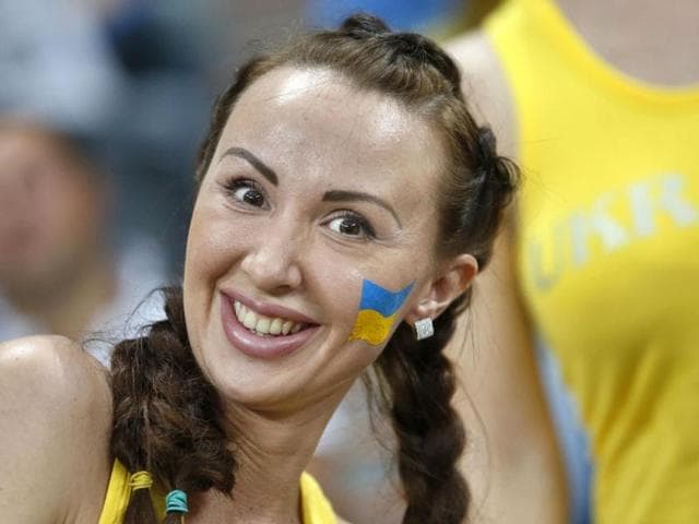 A Ukraine supporter smiles prior to the Euro 2012 soccer championship Group D match between Ukraine and France in Donetsk, Ukraine. AP Photo/Matthias Schrader A Ukraine supporter smiles prior to the Euro 2012 soccer championship Group D match between Ukraine and France in Donetsk, Ukraine. AP Photo/Matthias Schrader