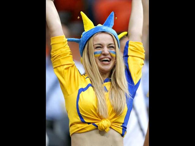 Ukrainian soccer fan cheers before the Group D Euro 2012 soccer match against France at Donbass Arena in Donetsk. (Reuters/Charles Platiau)