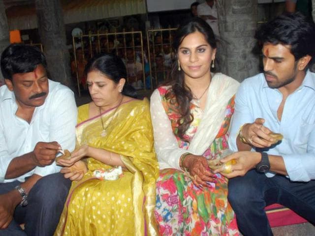 Happy family: (L-R) Chiranjeevi, his wife, Upasana and Ram Charan Teja. Happy family: (L-R) Chiranjeevi, his wife, Upasana and Ram Charan Teja.
