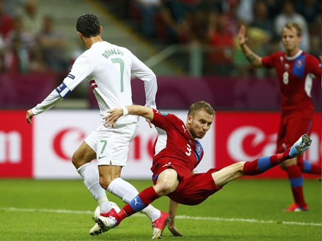 Portugal's Cristiano Ronaldo and Czech Republic's Michal Kadlec (R) fight for the ball during their Euro 2012 quarter-final soccer match at the National stadium in Warsaw. Reuters/Kai Pfaffenbach Portugal's Cristiano Ronaldo and Czech Republic's Michal Kadlec (R) fight for the ball during their Euro 2012 quarter-final soccer match at the National stadium in Warsaw. Reuters/Kai Pfaffenbach
