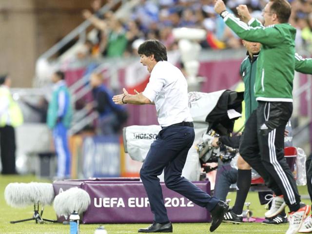 Germany's coach Joachim Loew celebrates a goal against Greece during their Euro 2012 quarter-final soccer match at the PGE Arena in Gdansk. (Reuters/Thomas Bohlen)
