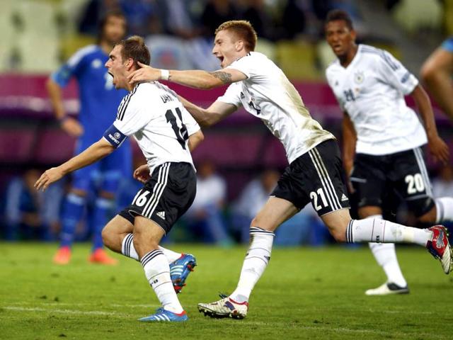 Germany's Philipp Lahm (L) and Marco Reus celebrate after Lahm scored a goal during the Euro 2012 quarter-final soccer match against Greece at the PGE Arena in Gdansk. (Reuters/Kai Pfaffenbach)