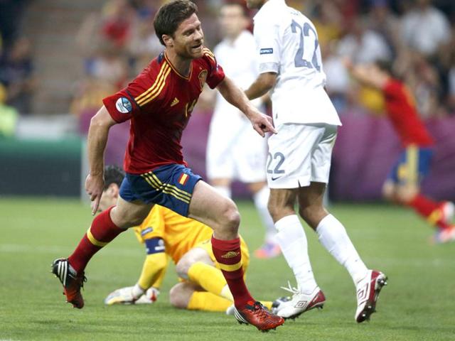 Spain's Xabi Alonso celebrates after scoring a goal against France during their Euro 2012 quarter-final soccer match at Donbass Arena in Donetsk. Reuters/Michael Buholzer
