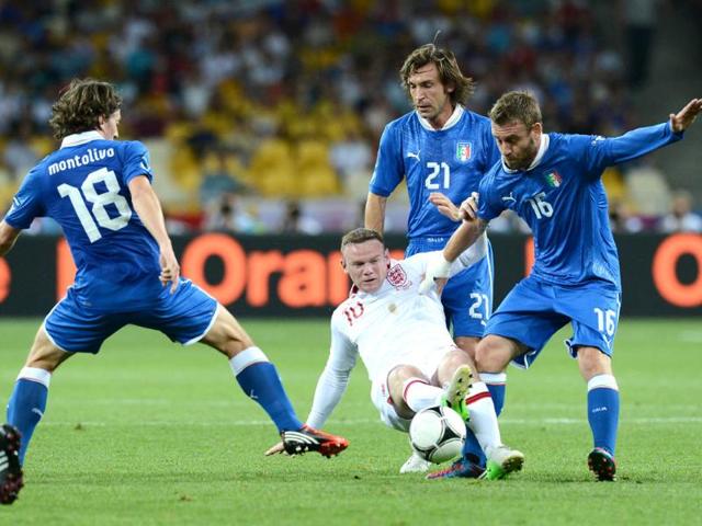 Italian-defender-Leonardo-Bonucci-top-R-vies-with-English-forward-Danny-Welbeck-C-during-the-Euro-2012-football-championships-quarter-final-match-England-vs-Italy-at-the-Olympic-Stadium-in-Kiev-AFP-photo-Carl-De-Souza Italian-defender-Leonardo-Bonucci-top-R-vies-with-English-forward-Danny-Welbeck-C-during-the-Euro-2012-football-championships-quarter-final-match-England-vs-Italy-at-the-Olympic-Stadium-in-Kiev-AFP-photo-Carl-De-Souza