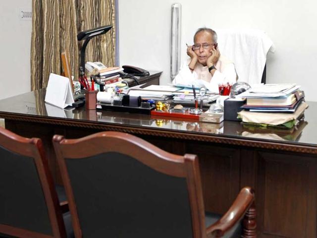 UPA Presidential candidate Pranab Mukherjee finishes work at home after his resignation as finance minister, in New Delhi. HT/Ajay Aggarwal
