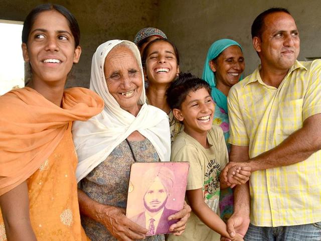 Surjeet Singh's family celebrates after learning that Surjeet would be released by Pakistan. (Kulbir Beera/HT Photo)