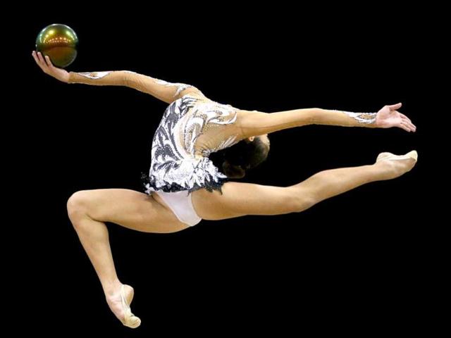 Rebecca Sereda competes during the rhythmic all-around finals at the USA Gymnastics Championships in San Jose, Calif. AP Photo/Jae C Hong