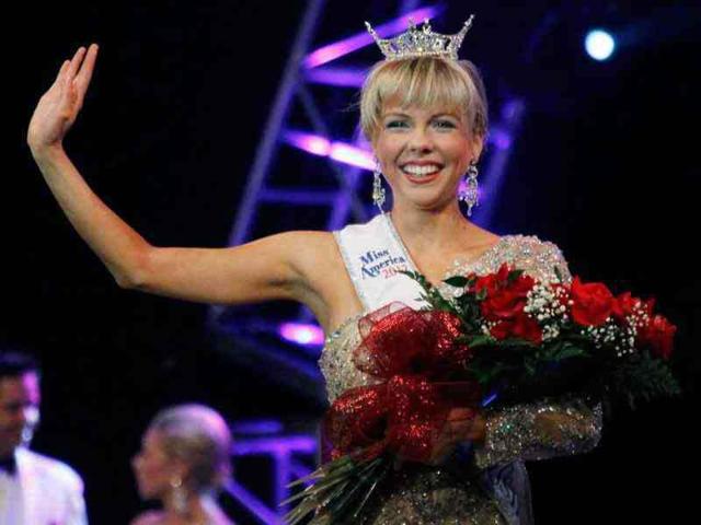 Miss Mississippi 2012 Marie Wicks waves as she makes her walk around the stage after being selected the winner during the televised scholarship pageant in Vicksburg. AP/Rogelio V Solis