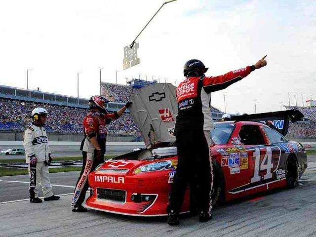 Tony Stewart, driver of the #14 Office Depot/Mobil 1 Chevrolet, pits during the NASCAR Sprint Cup Series Quaker State 400 at Kentucky Speedway in Sparta, Kentucky. AFP/Jared C. Tilton