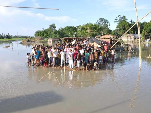 BJP National general secretary Vijay Goel visits flood-hit Pasalivillage under Laharighat in Assam. Incessant heavy rains have caused massive flooding and landslides in the state.