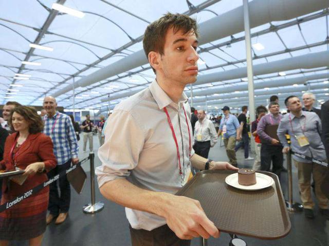 Guests test the 5,000 capacity Olympic Village dining room, a temporary structure built for the London 2012 Olympic Games in Stratford, east London. The village will accomodate up to 16,000 athletes and officials from more than 200 nations. Reuters/Olivia Harris