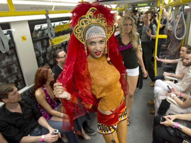 A model presents a creation during the "Underground Catwalk" fashion show in a U-Bahn subway train in Berlin. (Reuters)