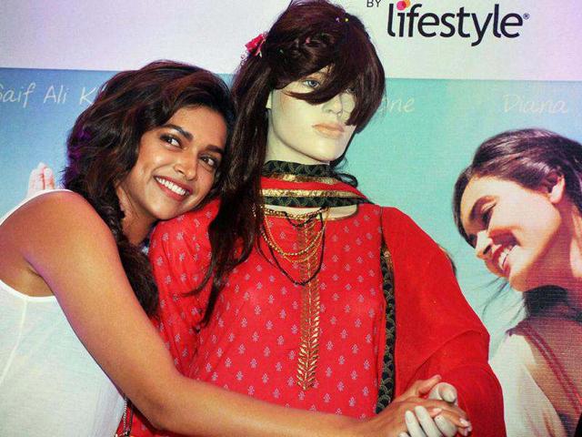 Deepika Padukone smiles as she promotes her upcoming film Cocktail.