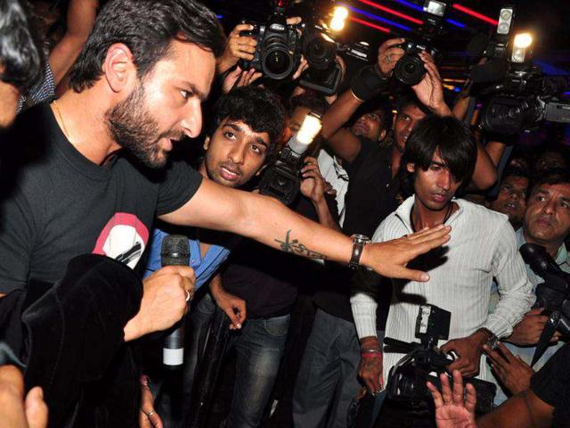 Saif Ali Khan with the cameramen.